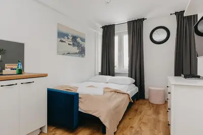 Łóżko lub łóżka w pokoju w obiekcie ShortStayPoland Pańska