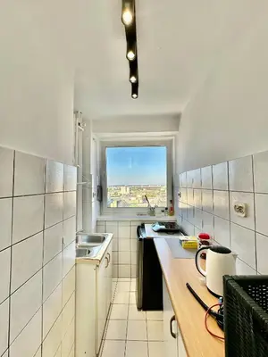 Kuchnia lub aneks kuchenny w obiekcie Super Apartament GREY Centrum 2x Metro Fast WiFi 300 Mbs Netflix AppleTV SmartTV Spotify Panorama Miasta
