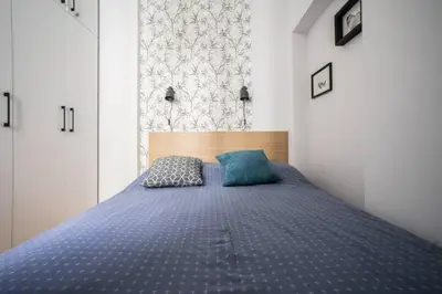 Łóżko lub łóżka w pokoju w obiekcie 5Eco Apart Pearl Jagiellonska 27 Warszawa Old Town