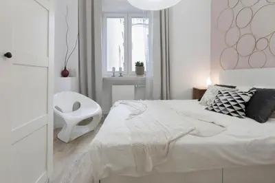 Łóżko lub łóżka w pokoju w obiekcie Warsaw Concierge Stalowa