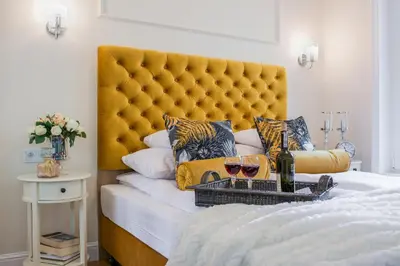 Łóżko lub łóżka w pokoju w obiekcie Warsaw Seasons by Alluxe Boutique Apartments