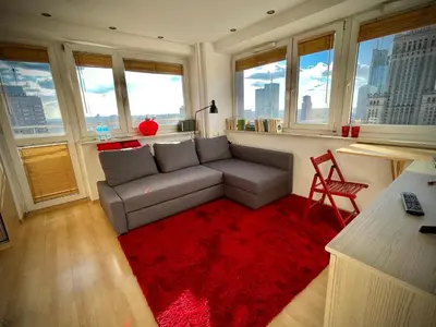 Część wypoczynkowa w obiekcie Super Apartament RED Centrum Best View in Town 2x Metro Fast WiFi 300 Mbs Netflix AppleTV SmartTV Spotify Panorama Miasta