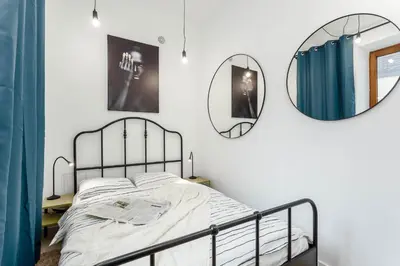 Łóżko lub łóżka w pokoju w obiekcie Chill Apartments Kopernik Center