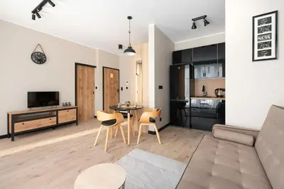 Telewizja i/lub zestaw kina domowego w obiekcie SuperApart Aignera apt 4, Family Friendly Oasis