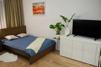 Łóżko lub łóżka w pokoju w obiekcie Studio Nr 4 close to Medicover and Paley Institute