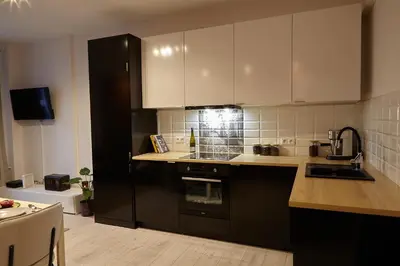 Kuchnia lub aneks kuchenny w obiekcie oompH Warsaw Central Premium Apartments