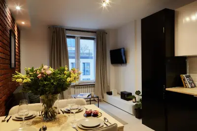 Telewizja i/lub zestaw kina domowego w obiekcie oompH Warsaw Central Premium Apartments