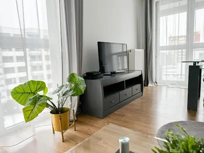 Telewizja i/lub zestaw kina domowego w obiekcie Warsaw Inside Apartments