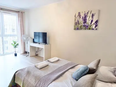 Telewizja i/lub zestaw kina domowego w obiekcie Warsaw Inside Apartments