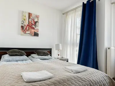 Łóżko lub łóżka w pokoju w obiekcie Warsaw Inside Apartments
