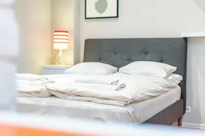 Łóżko lub łóżka w pokoju w obiekcie Apartament One by Your Freedom