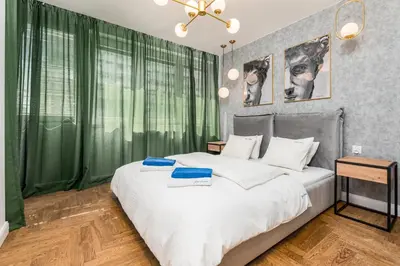 Łóżko lub łóżka w pokoju w obiekcie Apartament One by Your Freedom