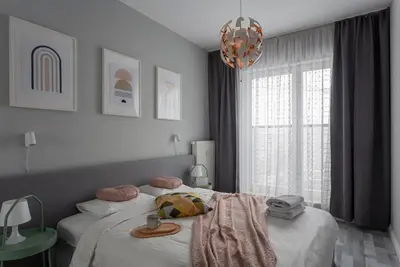 Łóżko lub łóżka w pokoju w obiekcie athome apartments - Chmielna 104