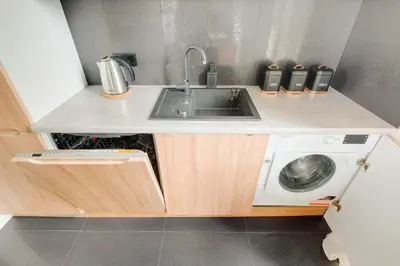 Kuchnia lub aneks kuchenny w obiekcie Apartamenty Patriotów 303