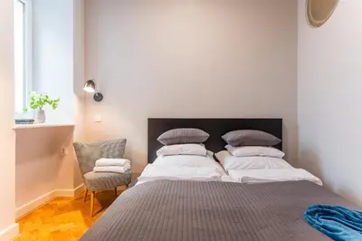 Łóżko lub łóżka w pokoju w obiekcie Apartment for rent Warsaw center