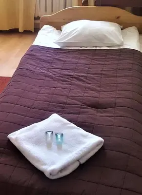 Łóżko lub łóżka w pokoju w obiekcie Hostel na Żurawiej