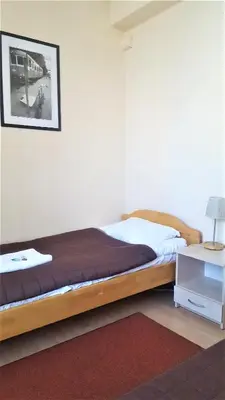 Łóżko lub łóżka w pokoju w obiekcie Hostel na Żurawiej