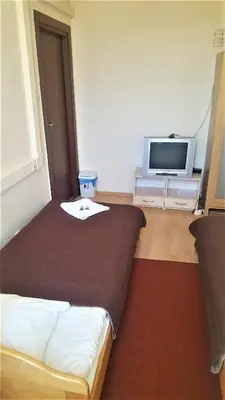 Łóżko lub łóżka w pokoju w obiekcie Hostel na Żurawiej