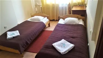Łóżko lub łóżka w pokoju w obiekcie Hostel na Żurawiej