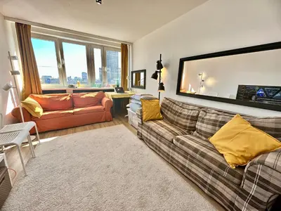 Część wypoczynkowa w obiekcie Super Apartament BROWN 2x Metro NOWY WiFi Netflix Spotify Panorama Miasta
