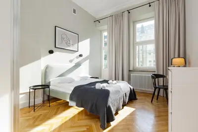 Łóżko lub łóżka w pokoju w obiekcie Apartment Warsaw Boduena by Renters Prestige