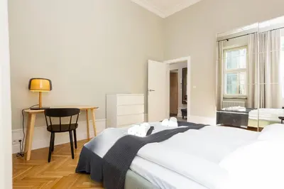 Łóżko lub łóżka w pokoju w obiekcie Apartment Warsaw Boduena by Renters Prestige