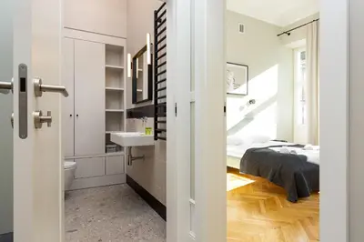 Łóżko lub łóżka w pokoju w obiekcie Apartment Warsaw Boduena by Renters Prestige
