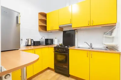 Kuchnia lub aneks kuchenny w obiekcie Metro Politechnika Vintage Apartment by BookingHost