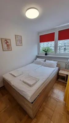 Łóżko lub łóżka w pokoju w obiekcie Like Home Flat G