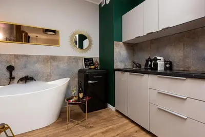 Kuchnia lub aneks kuchenny w obiekcie Love Suite Warsaw Wola by Noclegi Renters