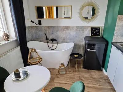 Kuchnia lub aneks kuchenny w obiekcie Love Suite Warsaw Wola by Noclegi Renters