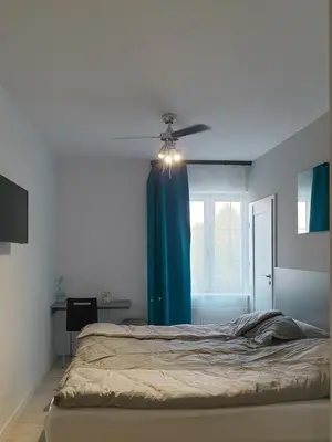 Łóżko lub łóżka w pokoju w obiekcie KOMFORT WILLA Plus