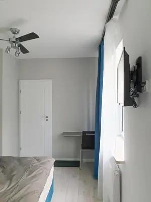 Łóżko lub łóżka w pokoju w obiekcie KOMFORT WILLA Plus