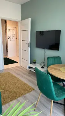 Telewizja i/lub zestaw kina domowego w obiekcie Grochowska Apartment
