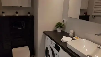 Kuchnia lub aneks kuchenny w obiekcie Grochowska Apartment
