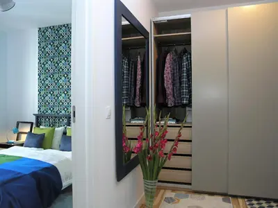 Łóżko lub łóżka w pokoju w obiekcie Apartament Metro Kowieńska