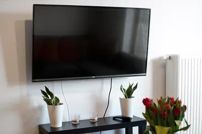 Telewizja i/lub zestaw kina domowego w obiekcie Airport Okecie Klobucka P&O Serviced Apartments
