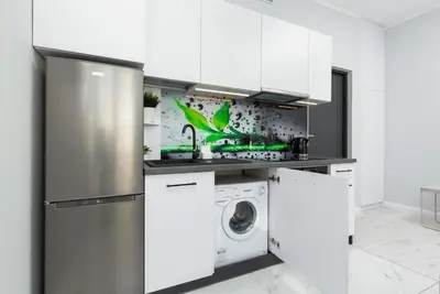 Kuchnia lub aneks kuchenny w obiekcie Stylish & Modern Apartments Praga by Noclegi Renters