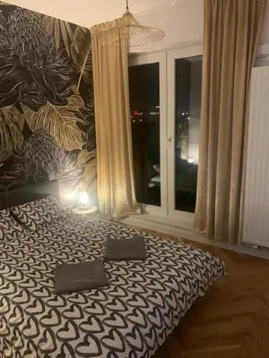 Łóżko lub łóżka w pokoju w obiekcie Apartament Mokotów Taśmowa
