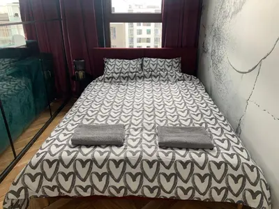 Łóżko lub łóżka w pokoju w obiekcie Apartamenty Wola Goleszowska