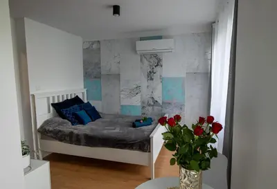 Łóżko lub łóżka w pokoju w obiekcie Apartament Ola