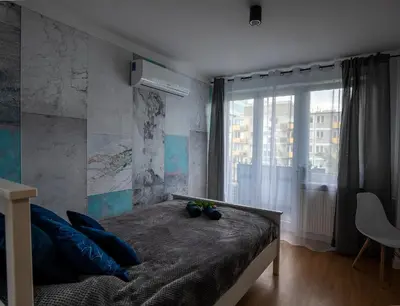 Łóżko lub łóżka w pokoju w obiekcie Apartament Ola