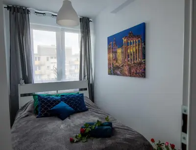 Łóżko lub łóżka w pokoju w obiekcie Apartament Marta
