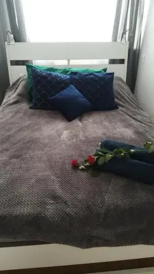 Łóżko lub łóżka w pokoju w obiekcie Apartament Marta