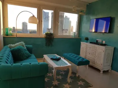 Telewizja i/lub zestaw kina domowego w obiekcie Centre Apartamenty Warszawa
