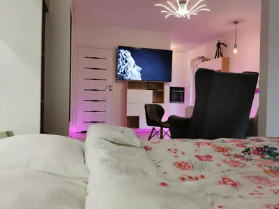 Telewizja i/lub zestaw kina domowego w obiekcie LUXURY APARTMENT