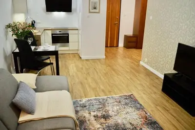Telewizja i/lub zestaw kina domowego w obiekcie Sunny apartment in Wilanów close Town Hall, Palace