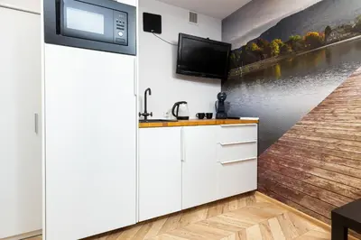 Kuchnia lub aneks kuchenny w obiekcie Affordable Underground Micro Apartment Grochowska by Noclegi Renters