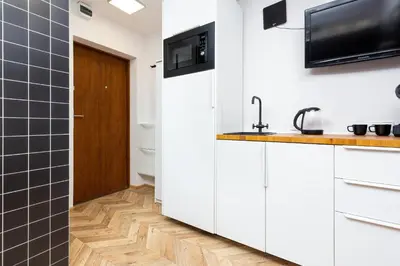 Kuchnia lub aneks kuchenny w obiekcie Affordable Underground Micro Apartment Grochowska by Noclegi Renters