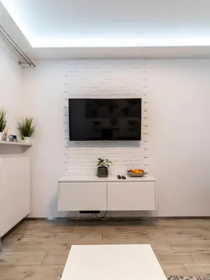 Telewizja i/lub zestaw kina domowego w obiekcie FIRST -- Green Żoliborz Apartment 5